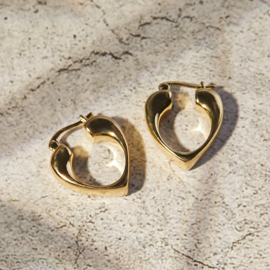 Gilded heartbeat earrings